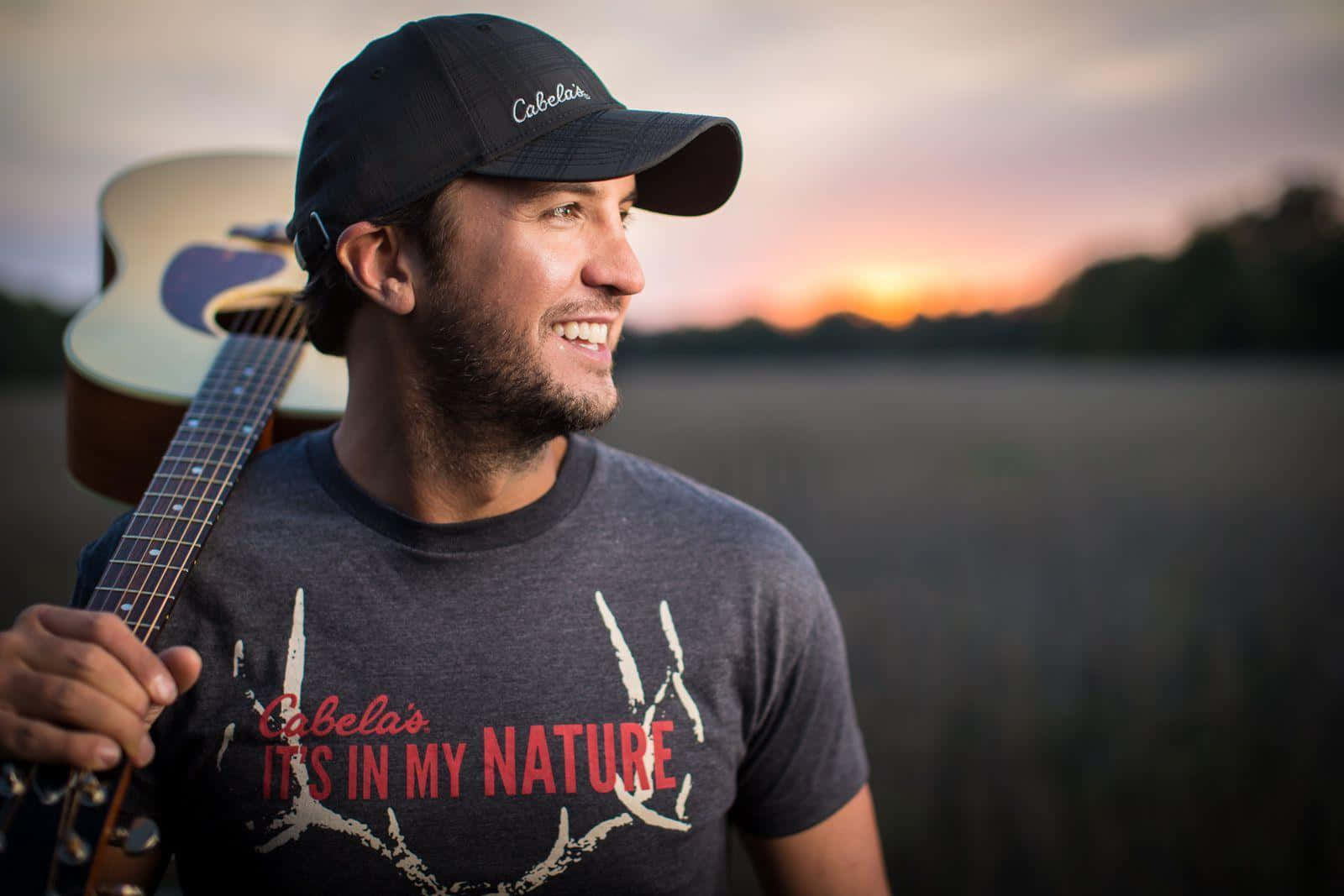 Luke Bryan Belts Out A Song Before Thousands Of Fans Background