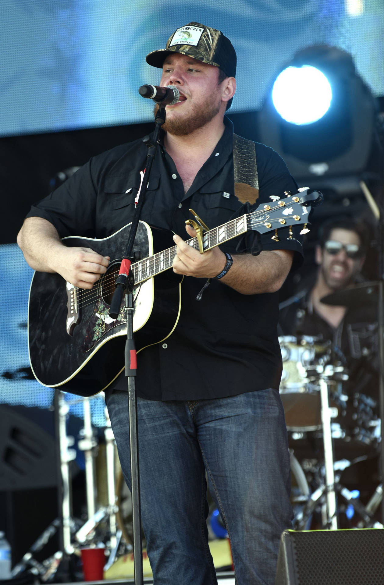 Luke Combs Rocking Out Onstage. Background