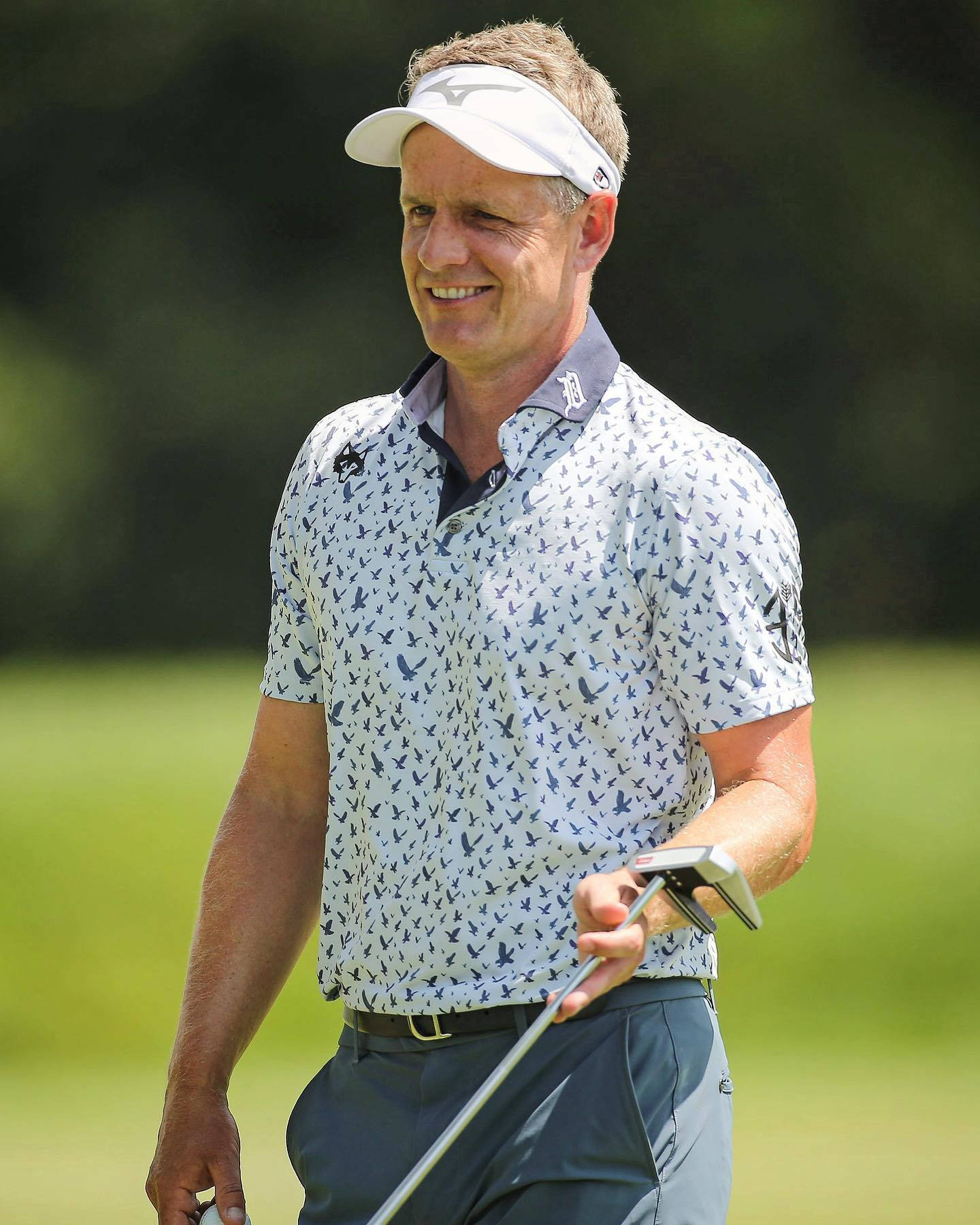 Luke Donald Smiling While Playing Background