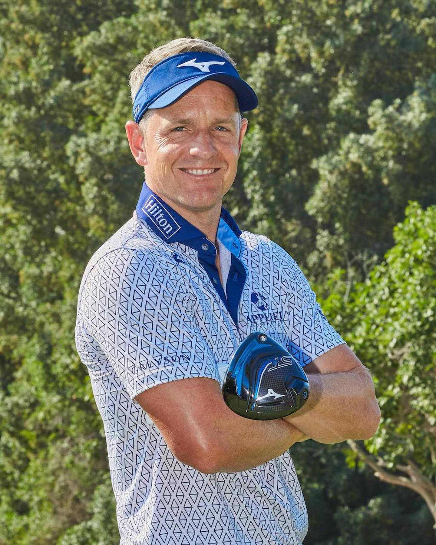 Luke Donald Wearing Hilton Background