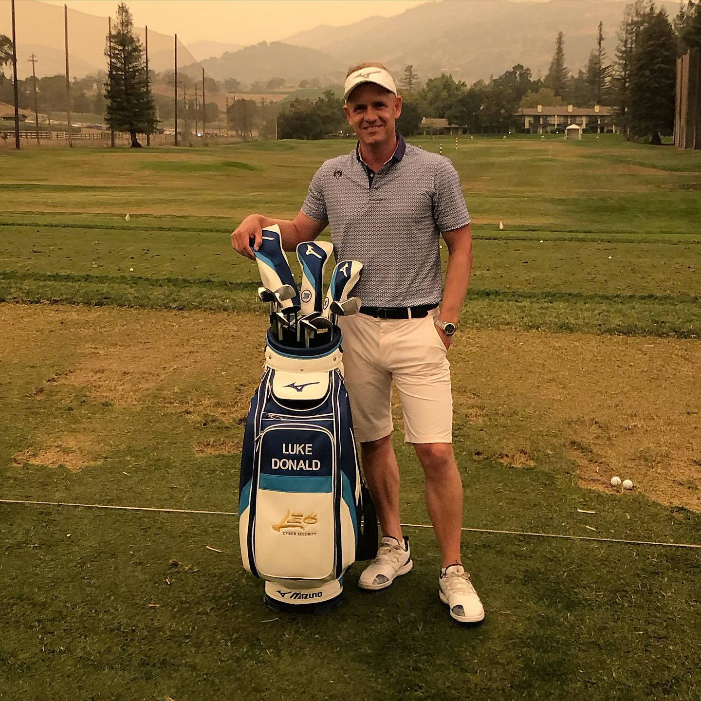 Luke Donald With His Golf Equipments Background