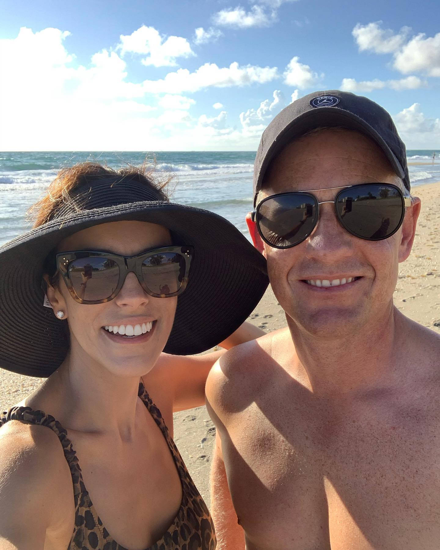 Luke Donald With His Wife Enjoying A Beach Vacation. Background