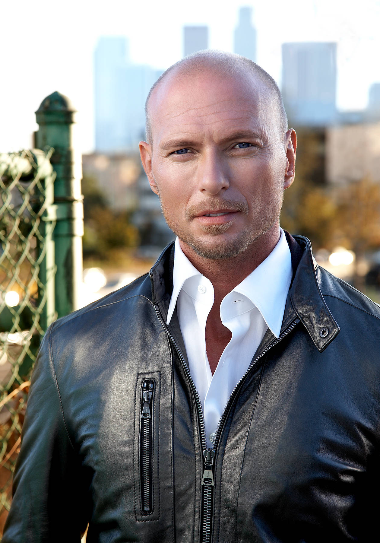 Luke Goss In Black Leather Jacket Background