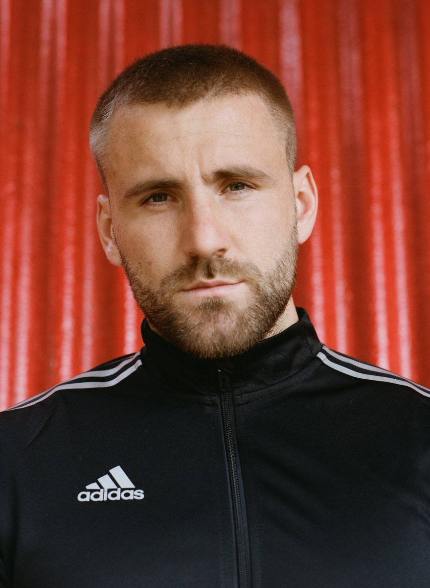 Luke Shaw In Black Adidas Jacket Background