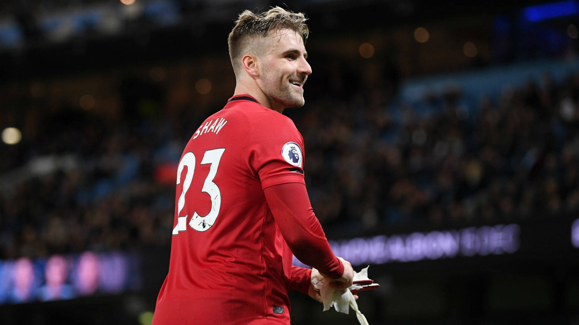 Luke Shaw Smiling Without Beard Background