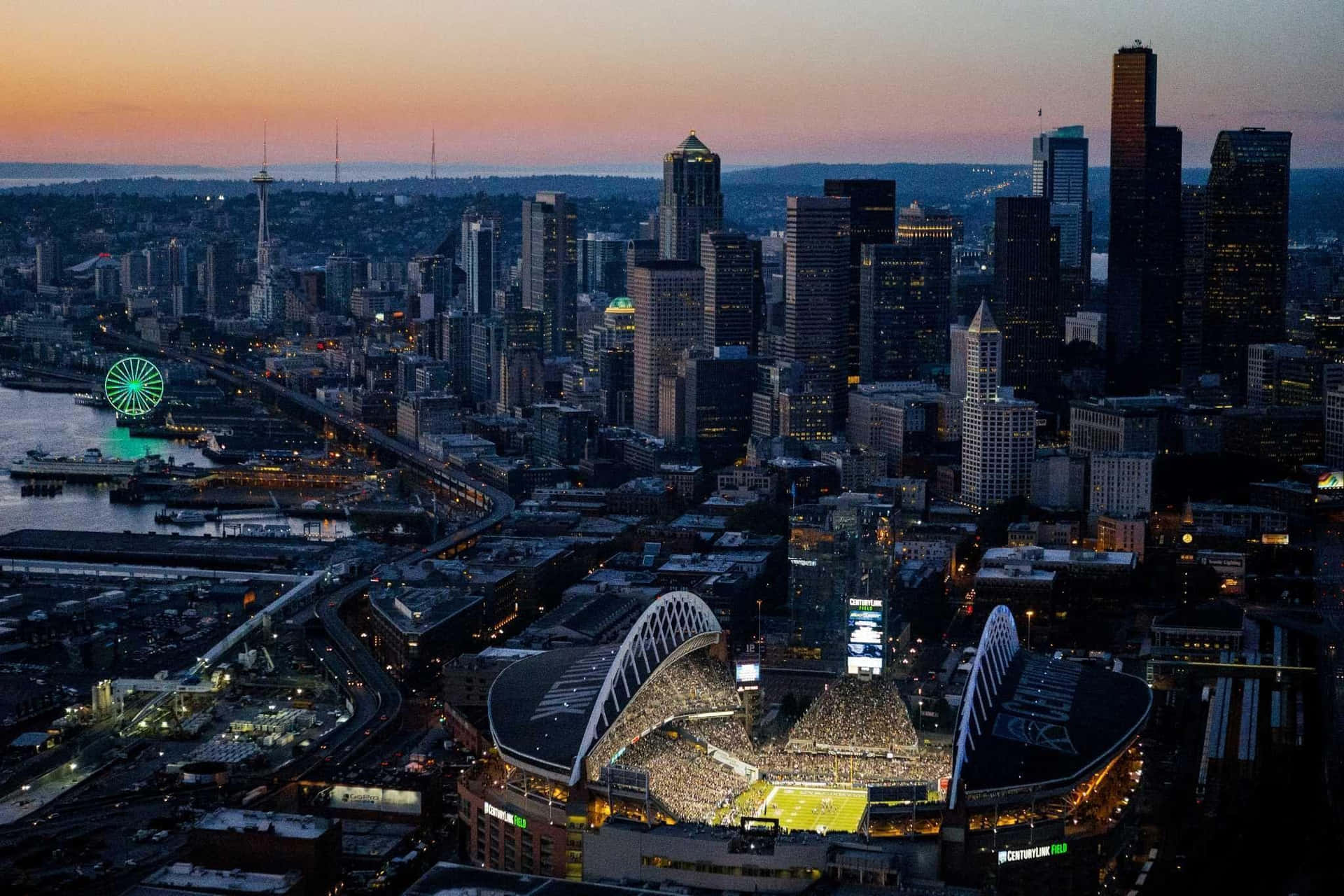 Lumen Field In Seattle At Night Background