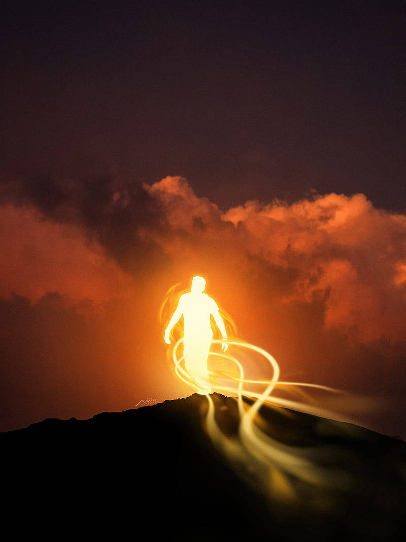 Luminous Man Soul On Mountain Background