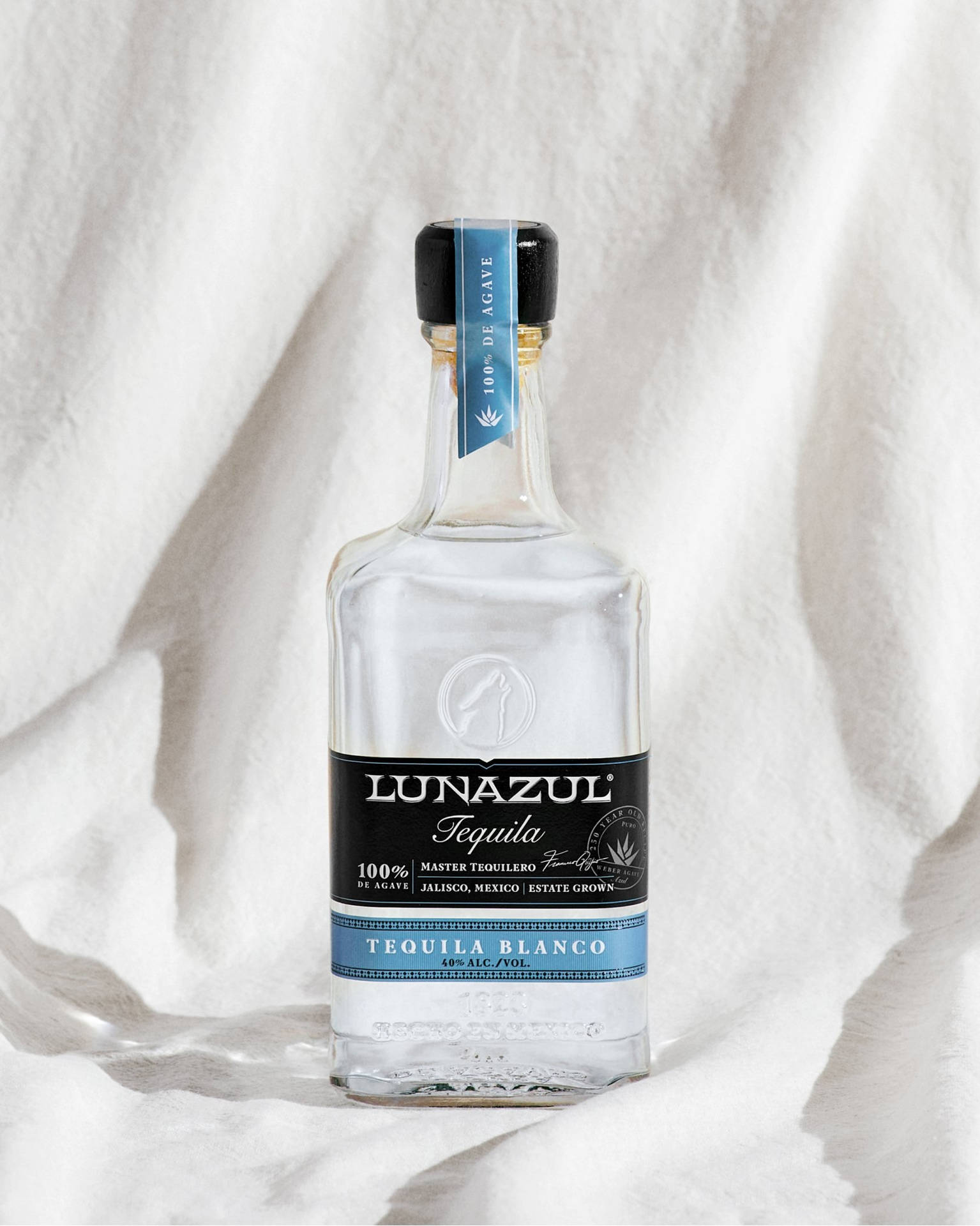 Lunazul Blanco Tequila White Cloth Background