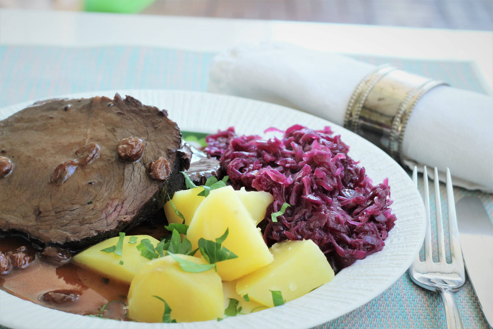 Luscious Sauerbraten Traditional German Dish Cabbage And Potatoes Background