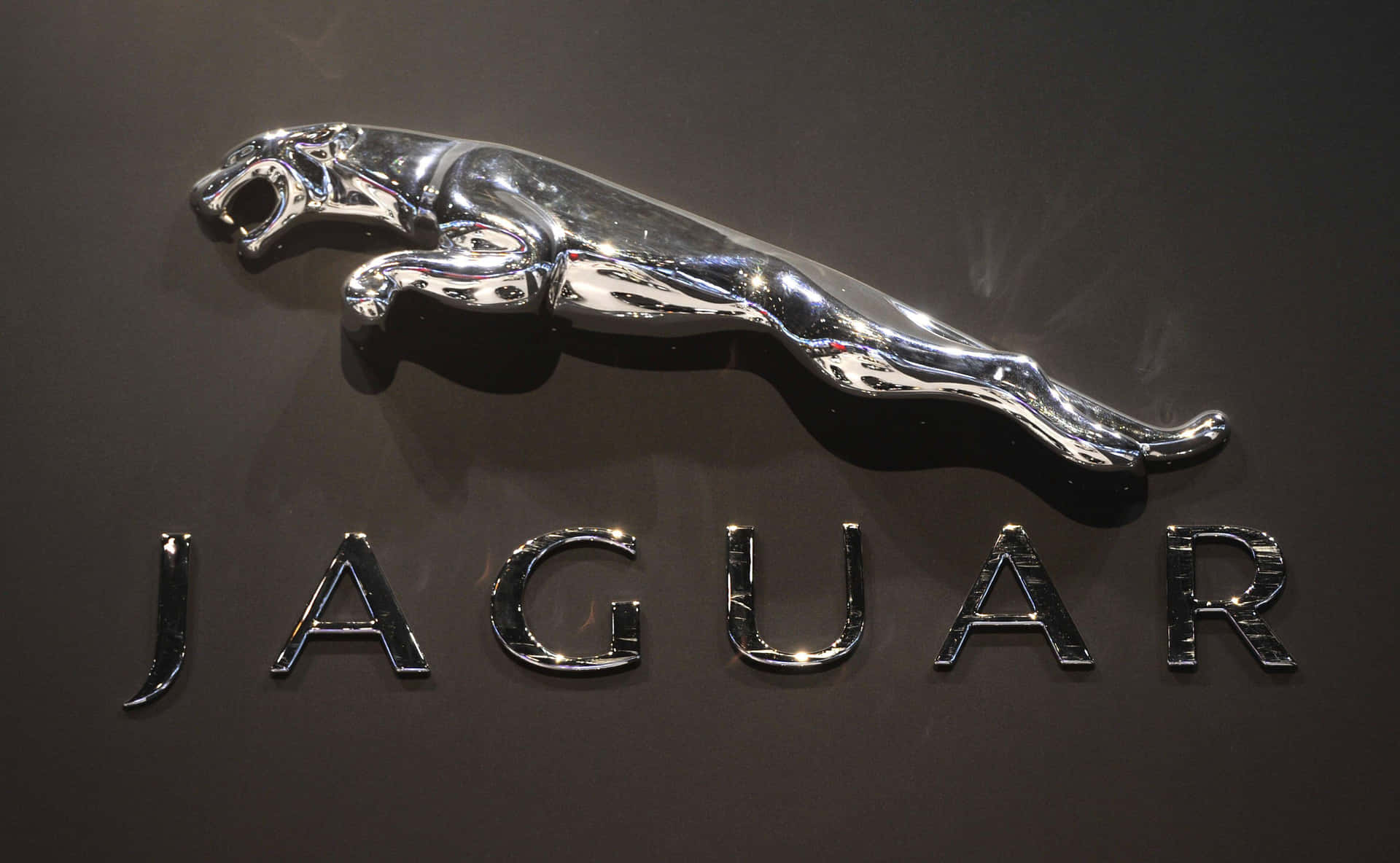Luxurious Car Logo On A Minimalistic Background Background