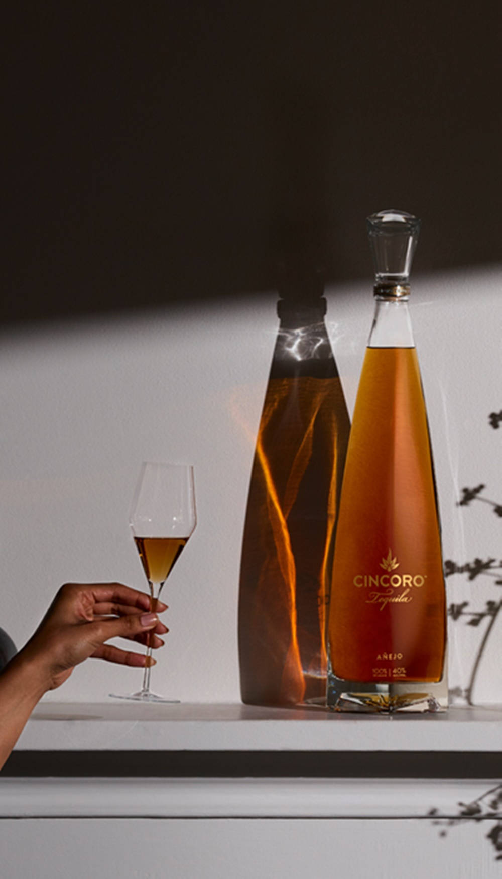 Luxurious Cincoro Anejo Tequila Distilled To Perfection Background