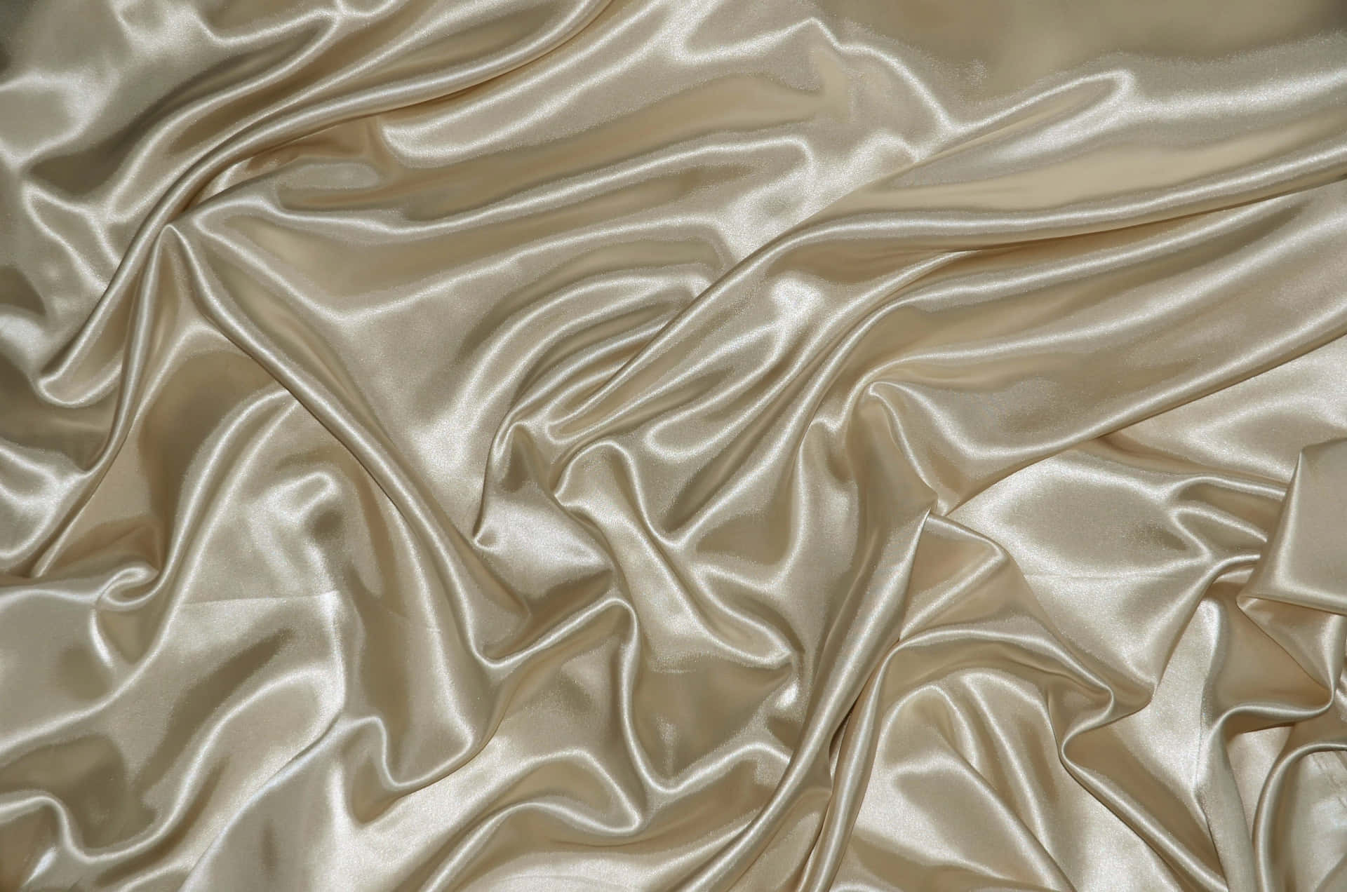 Luxurious Gold Silk Fabric Swatches Background