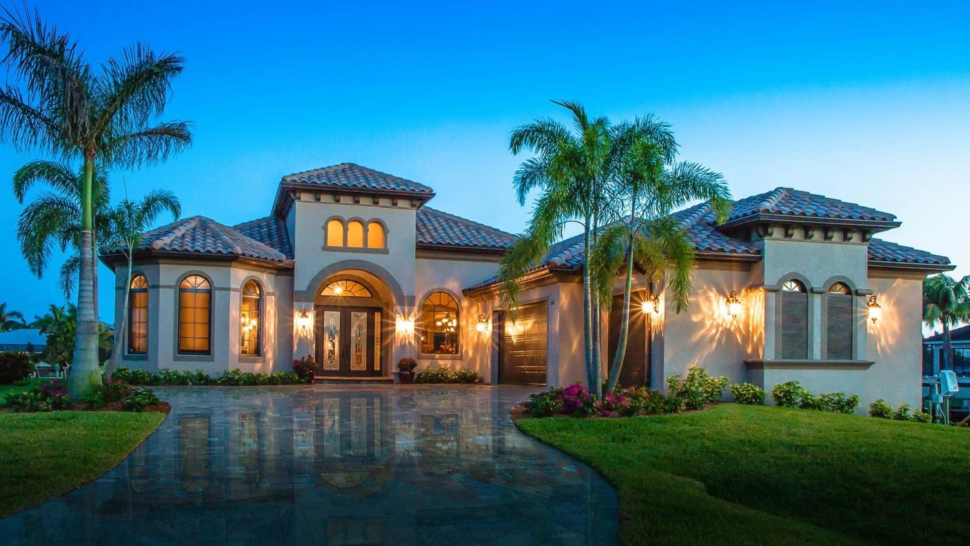 Luxurious Mansion Surrounded By Lush Palm Trees Background