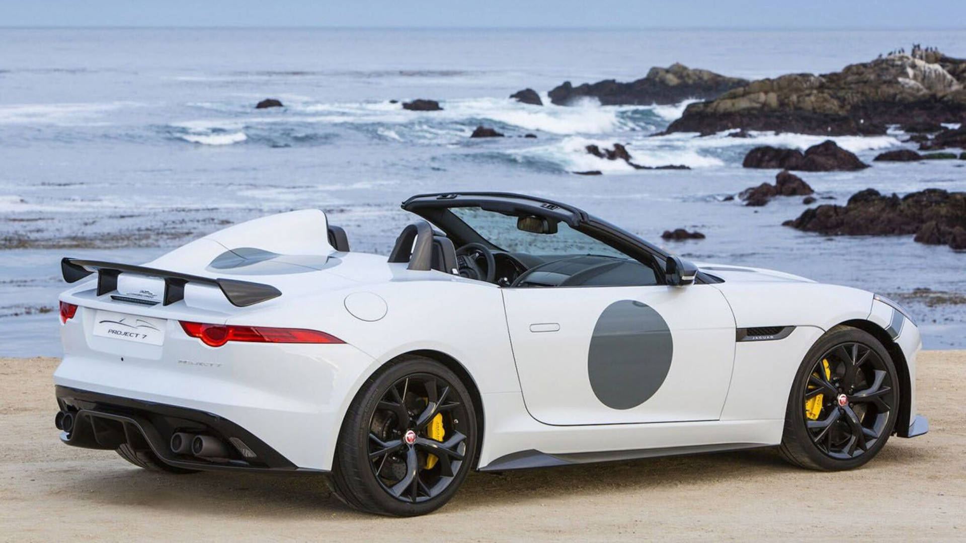 Luxurious Modern Jaguar Car On A Beach
