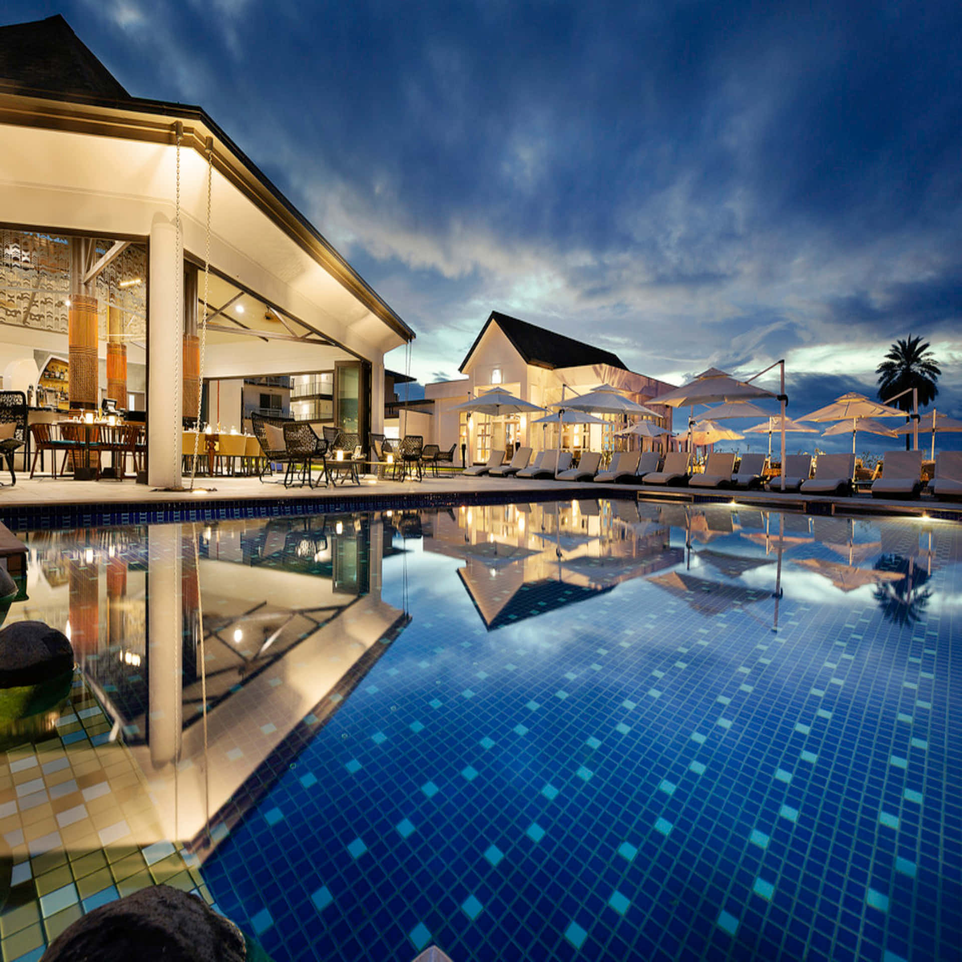 Luxurious Pool Resort Nighttime.