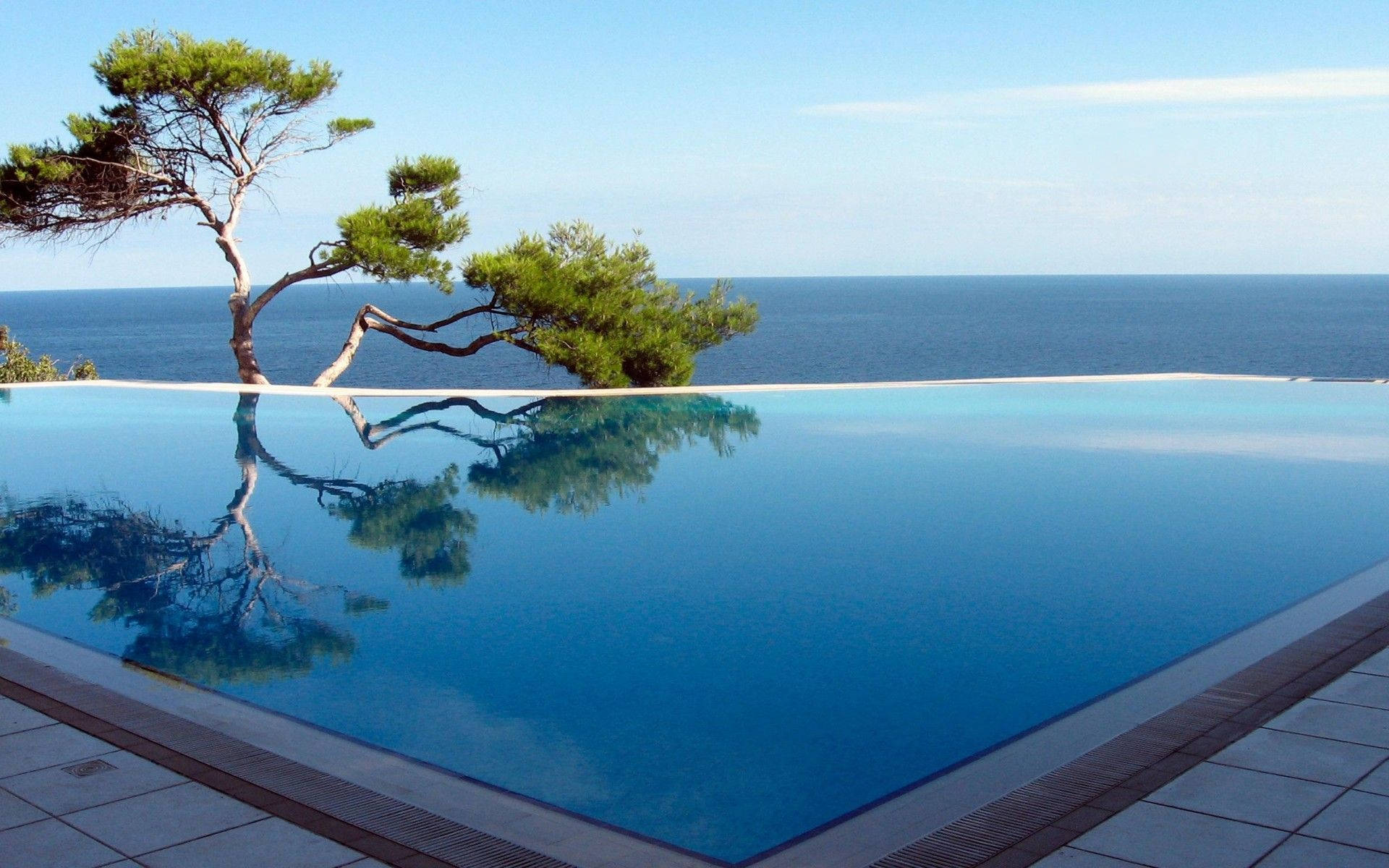 Luxurious Private Swimming Pool At Dusk Background