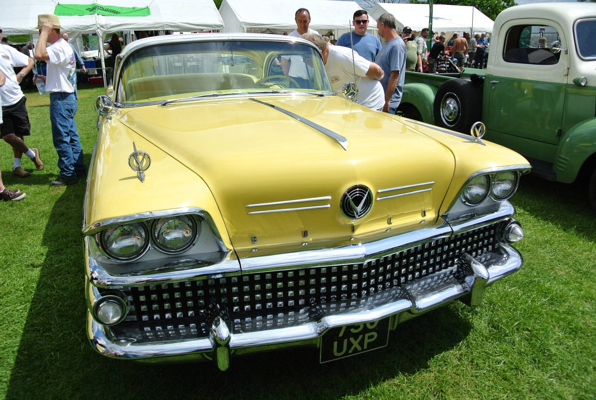 Luxurious Yellow Buick Limited Model Background