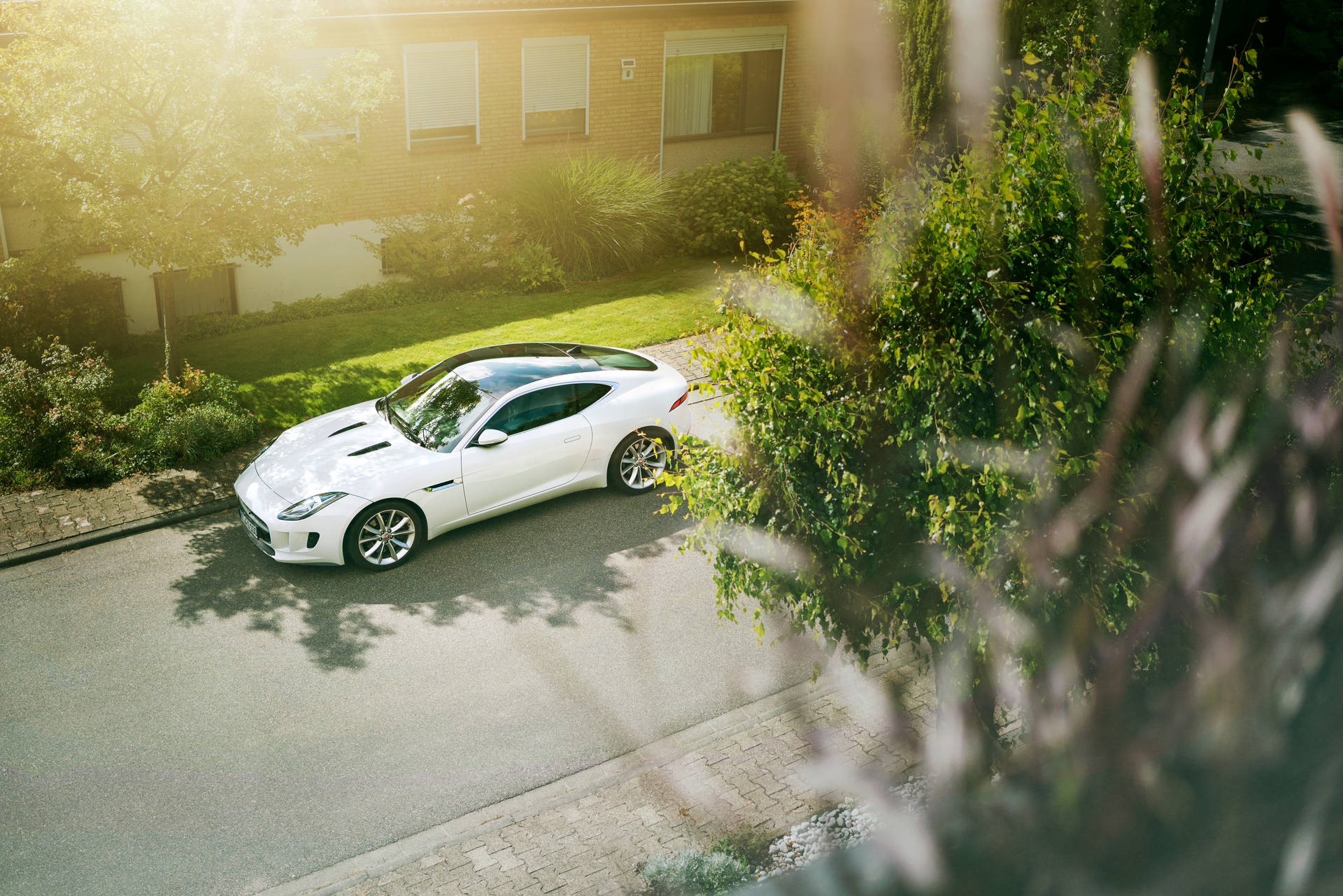 Luxury Car In Town Background