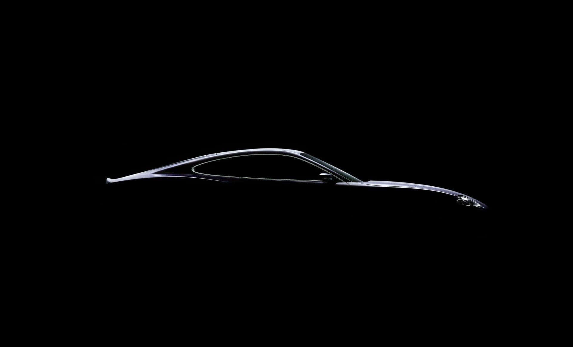 Luxury Car Logo On Glossy Black Surface Background