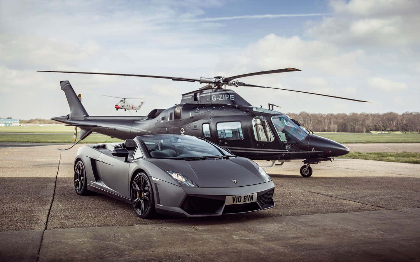 Luxury Cars And Private Jets: Enjoying Wealth And Freedom Background