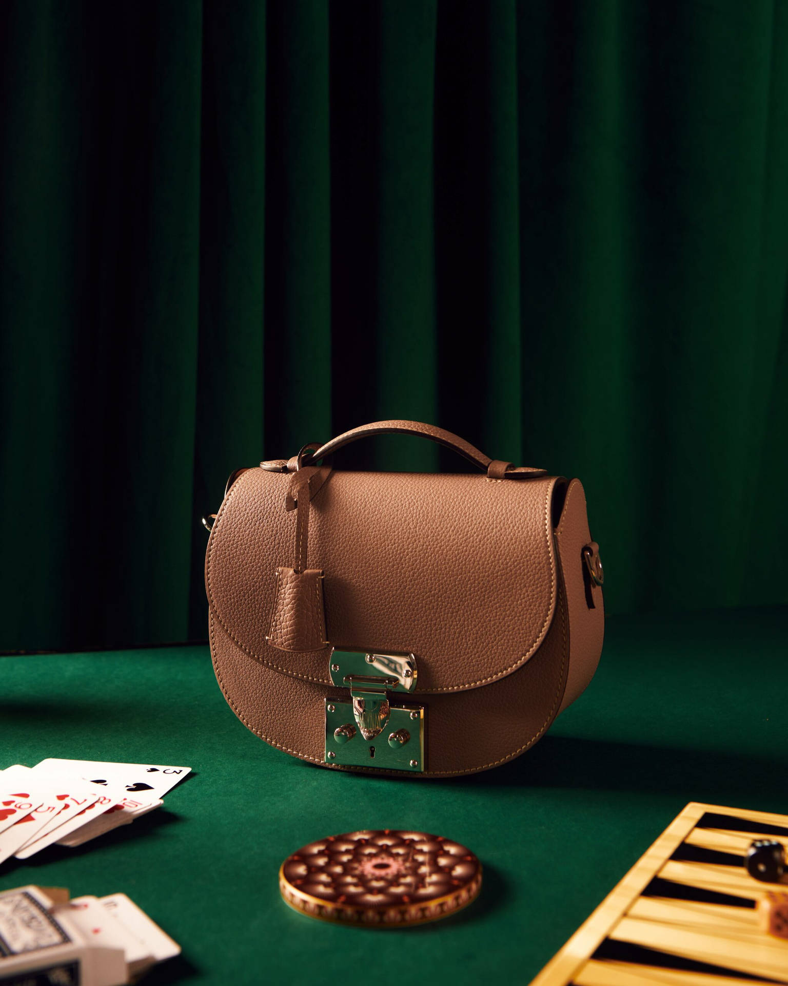 Luxury Leather Goods Crafted By Moynat Since 1849 Background