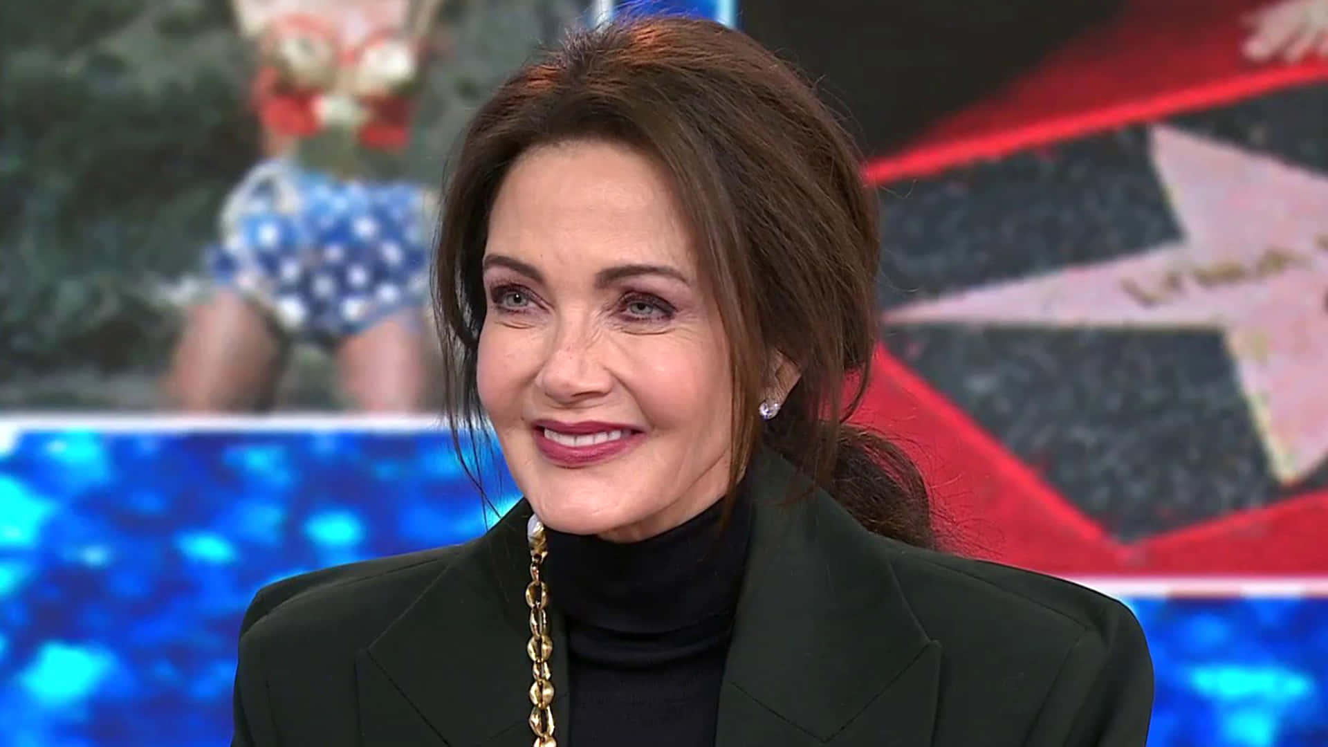 Lynda Carter Smiling During Interview Background