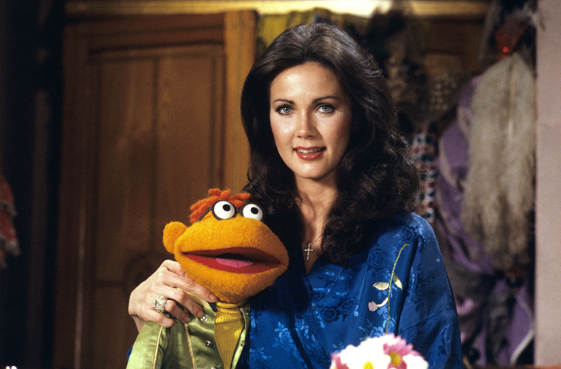 Lynda Carter With Muppet Fozzie Bear Background