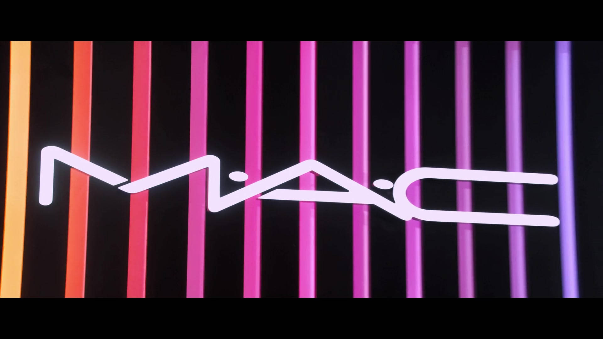 Mac Cosmetics Neon Logo Background