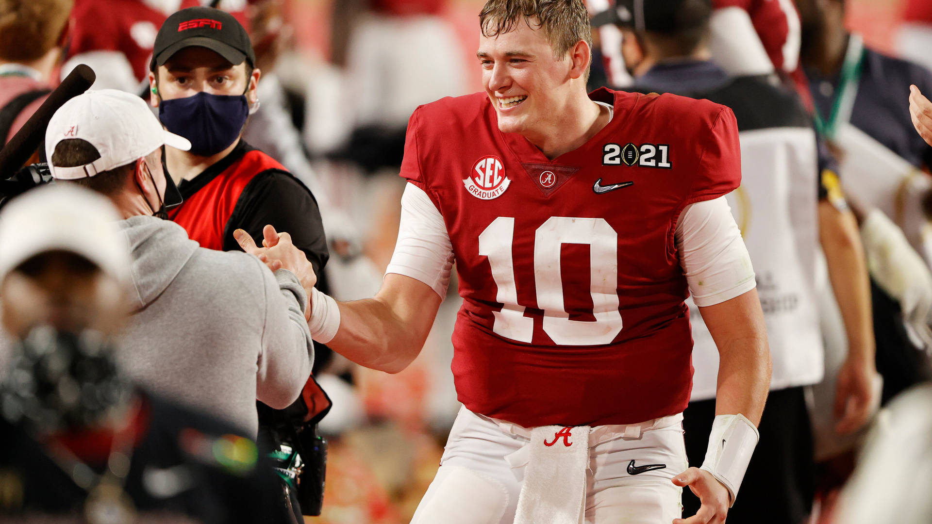 Mac Jones Delivering A Touchdown Pass