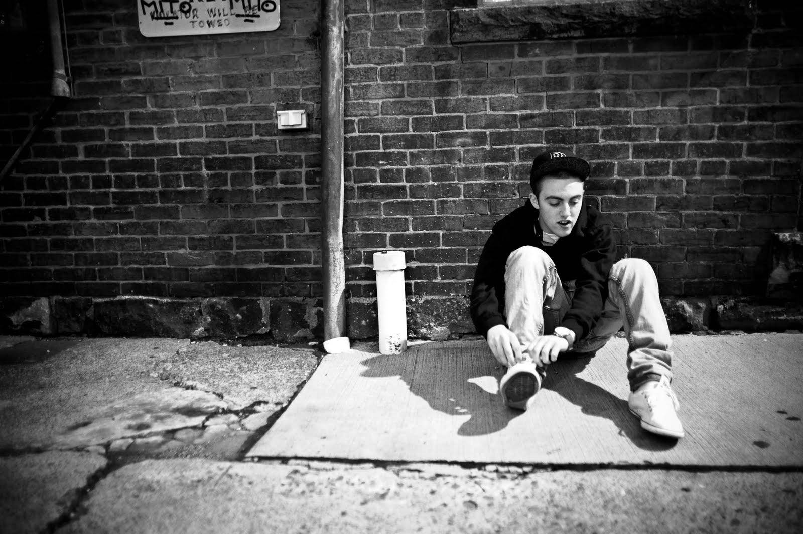 Mac Miller Fixing Shoes In Alley