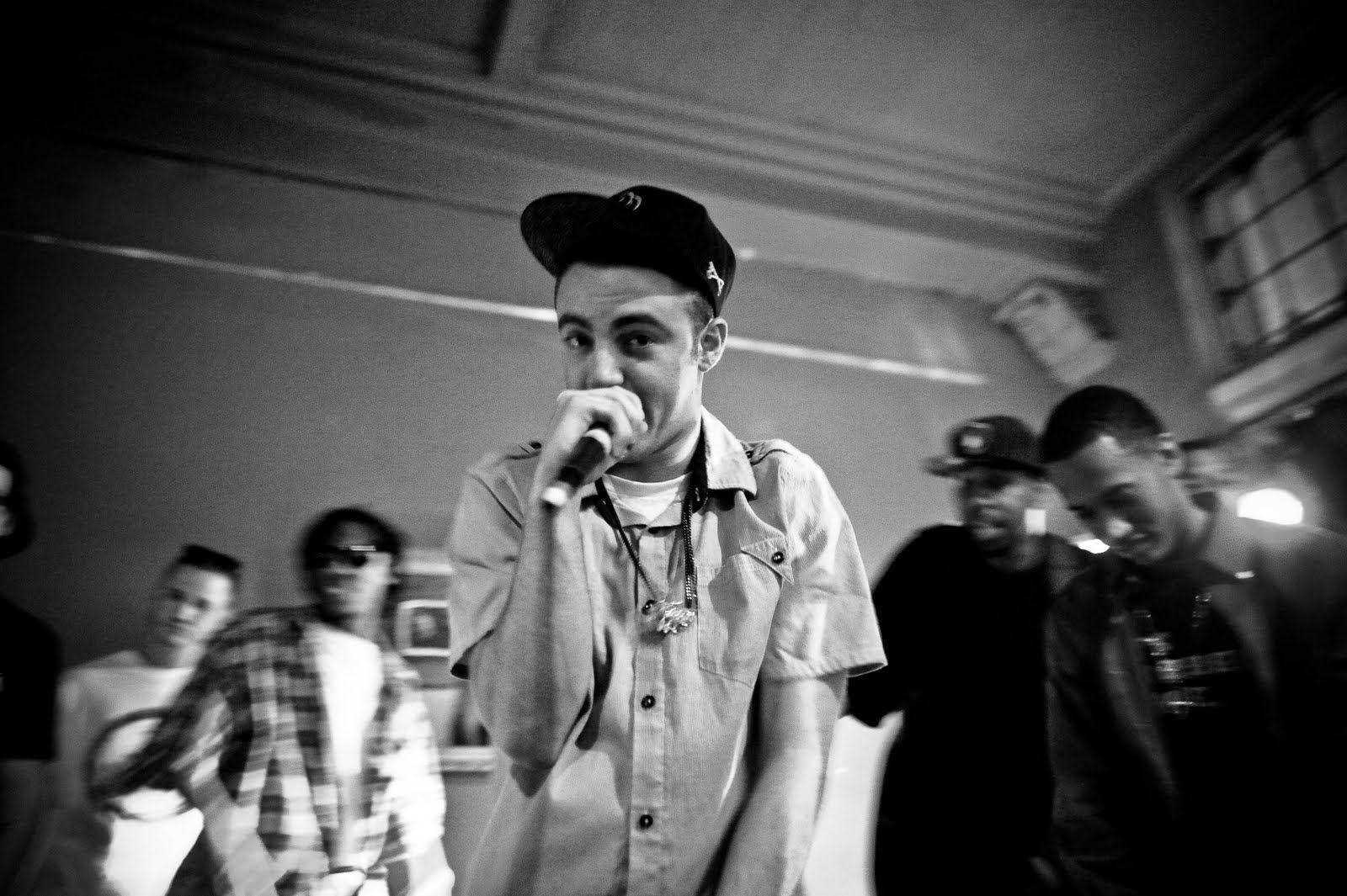 Mac Miller Holding Microphone Background