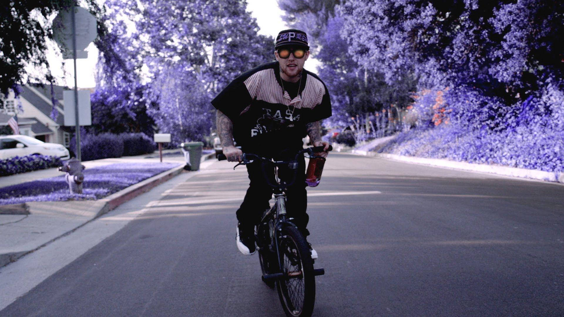 Mac Miller Riding Bicycle Background
