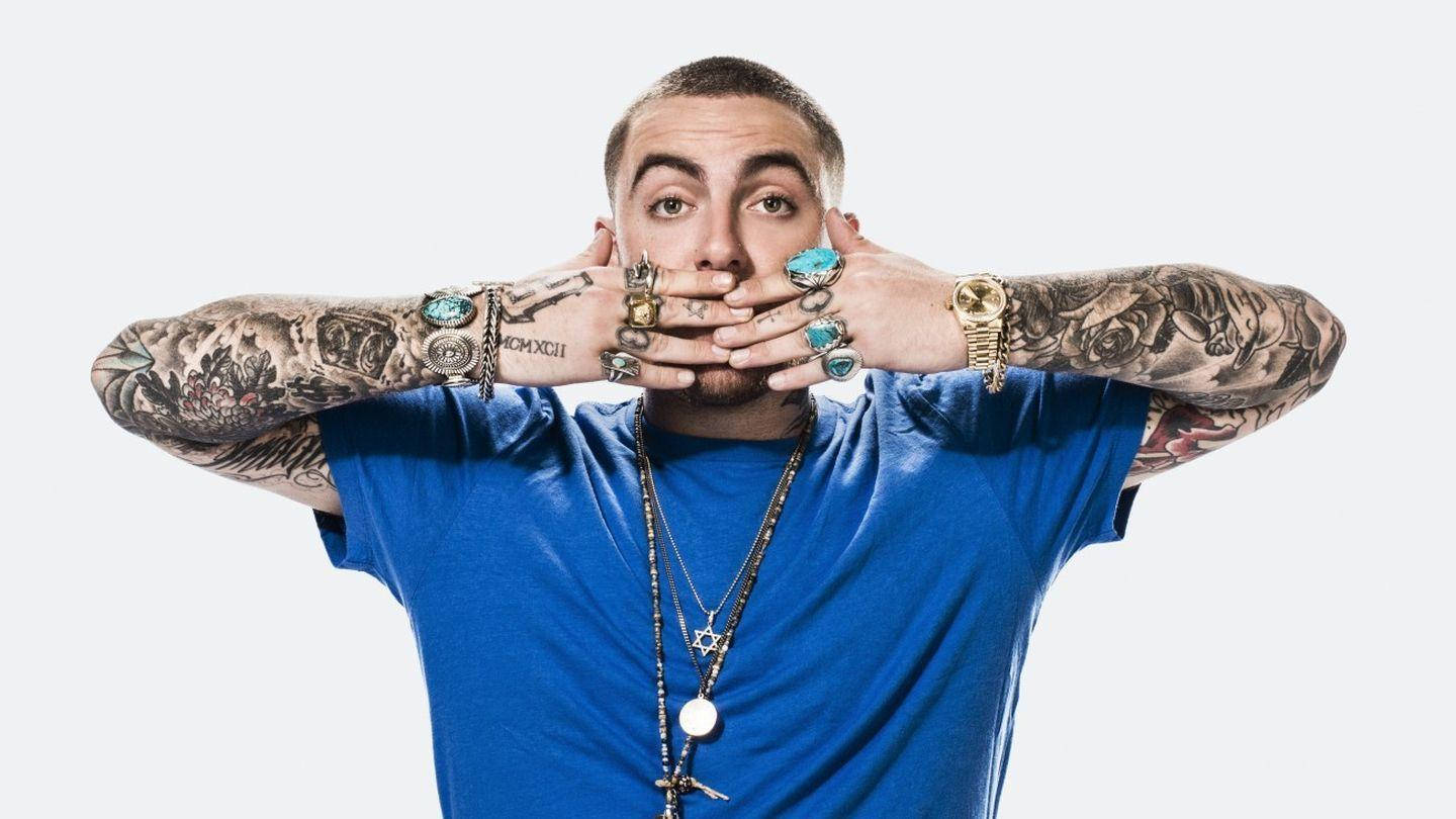 Mac Miller Showing Off Arm Tattoos Background