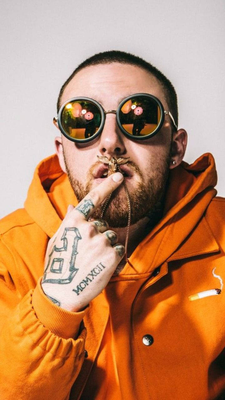 Mac Miller With Necklace On Mouth