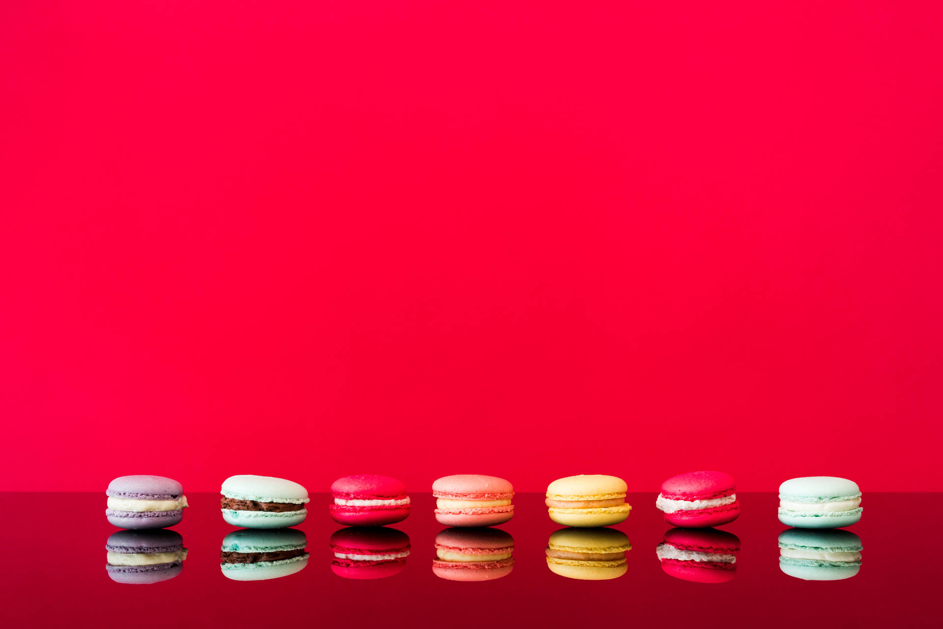 Macarons With Red Color Background