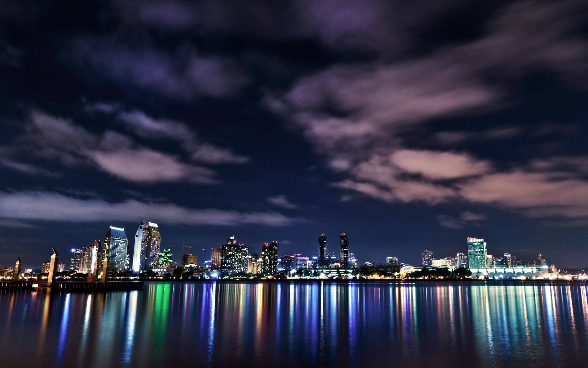 Macbook Pro Glowing Cityscape Background