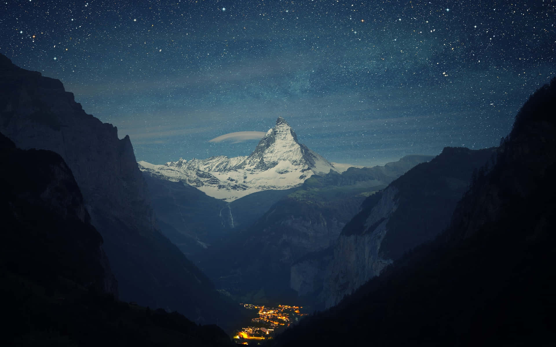 Macbook Retina With City In Valley Background