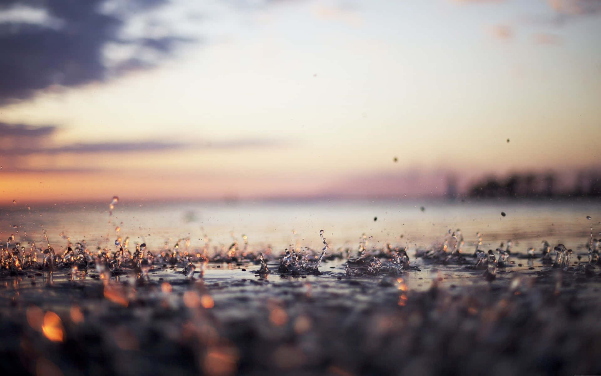 Macbook Retina With Rain Droplets Background