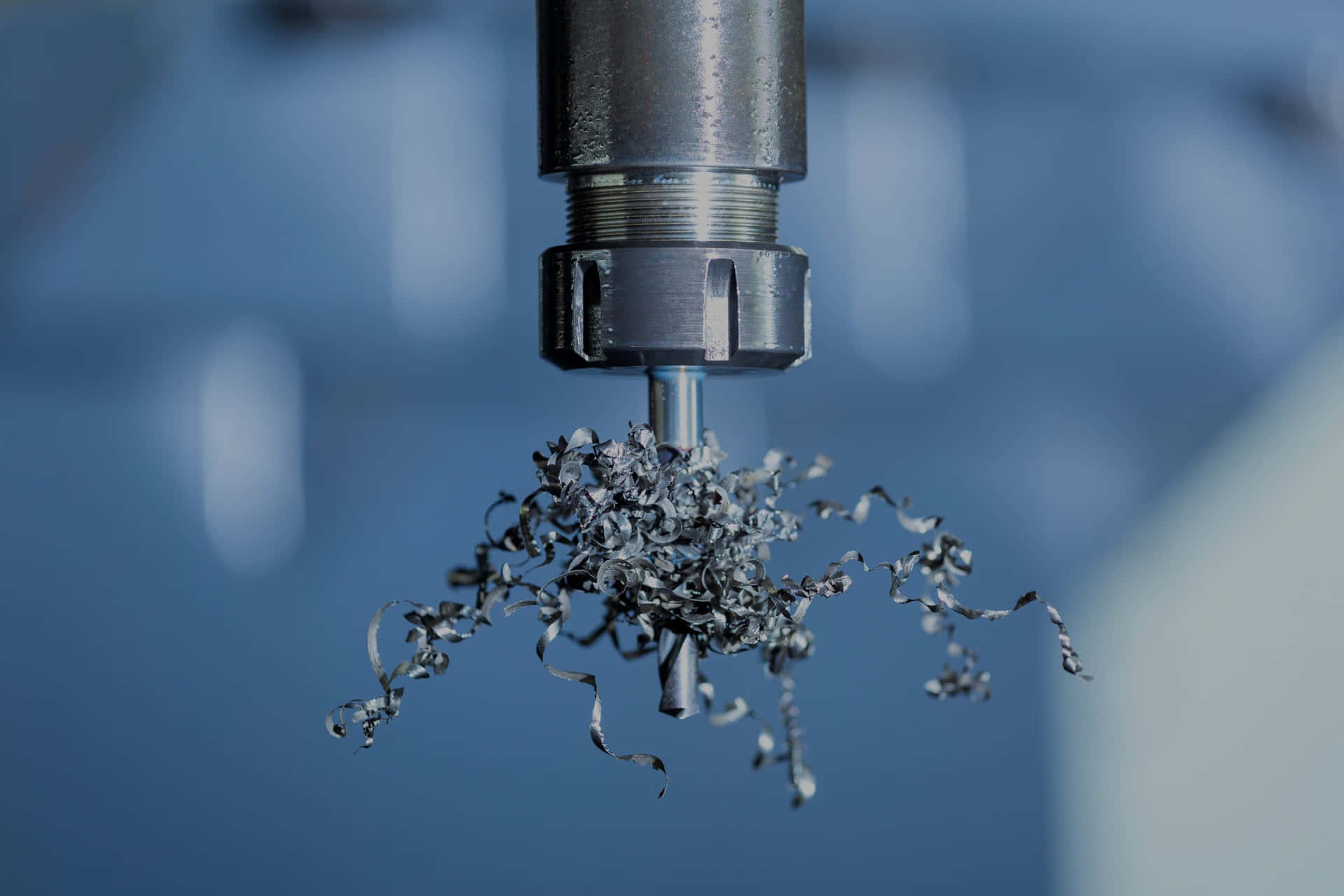 Machining Drill With Metal Shavings Background