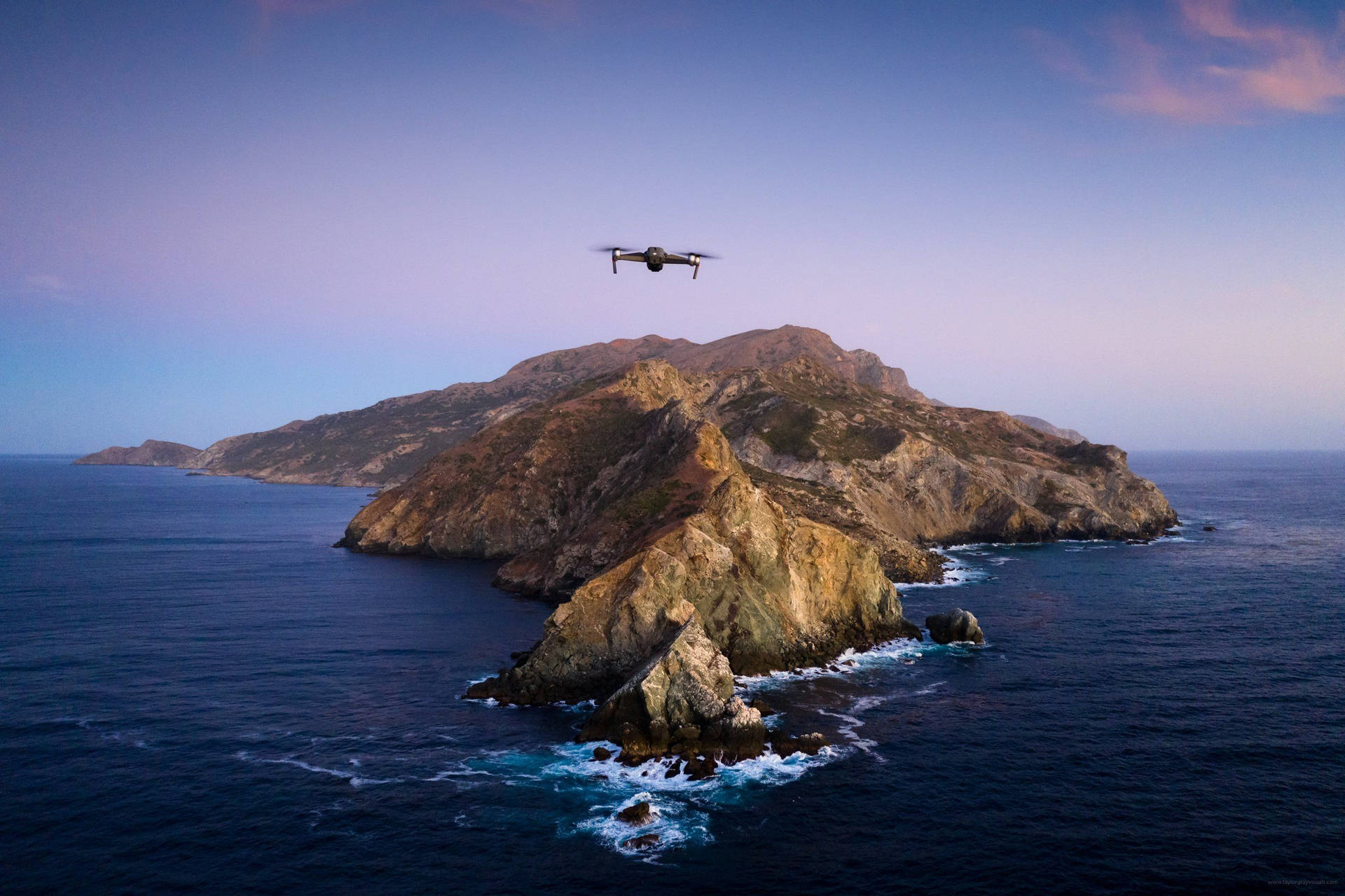 Macos Catalina With Drone Background