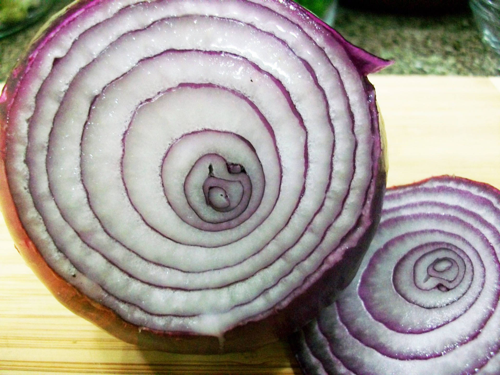 Macro Shot Of A Sliced Red Onion Background