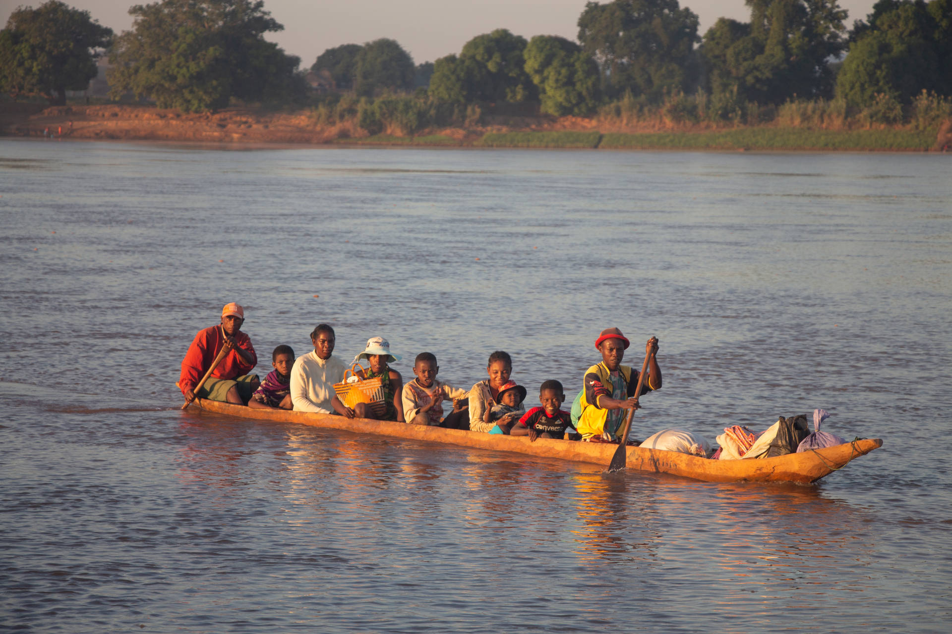Madagascar People Riding Kayak Background