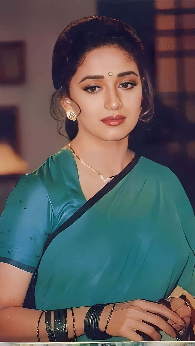 Madhuri Dixit Elegant Saree Look Background