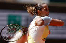 Madison Keys In Action At A Tennis Match Background