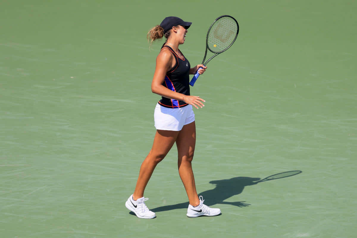 Madison Keys In Action On The Tennis Court.