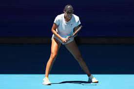 Madison Keys In Action On The Tennis Court Background