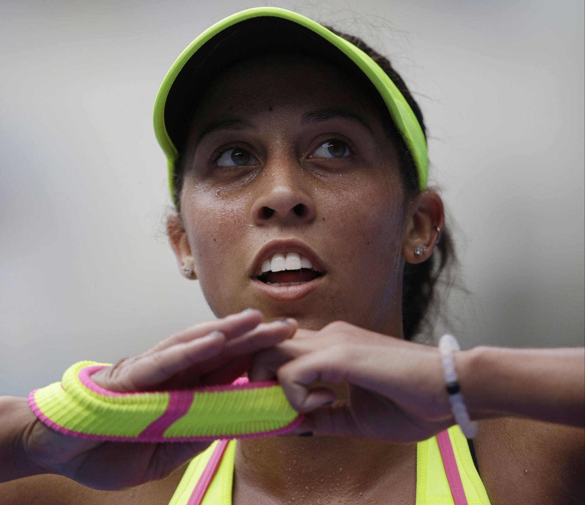 Madison Keys Putting Wristband On Background