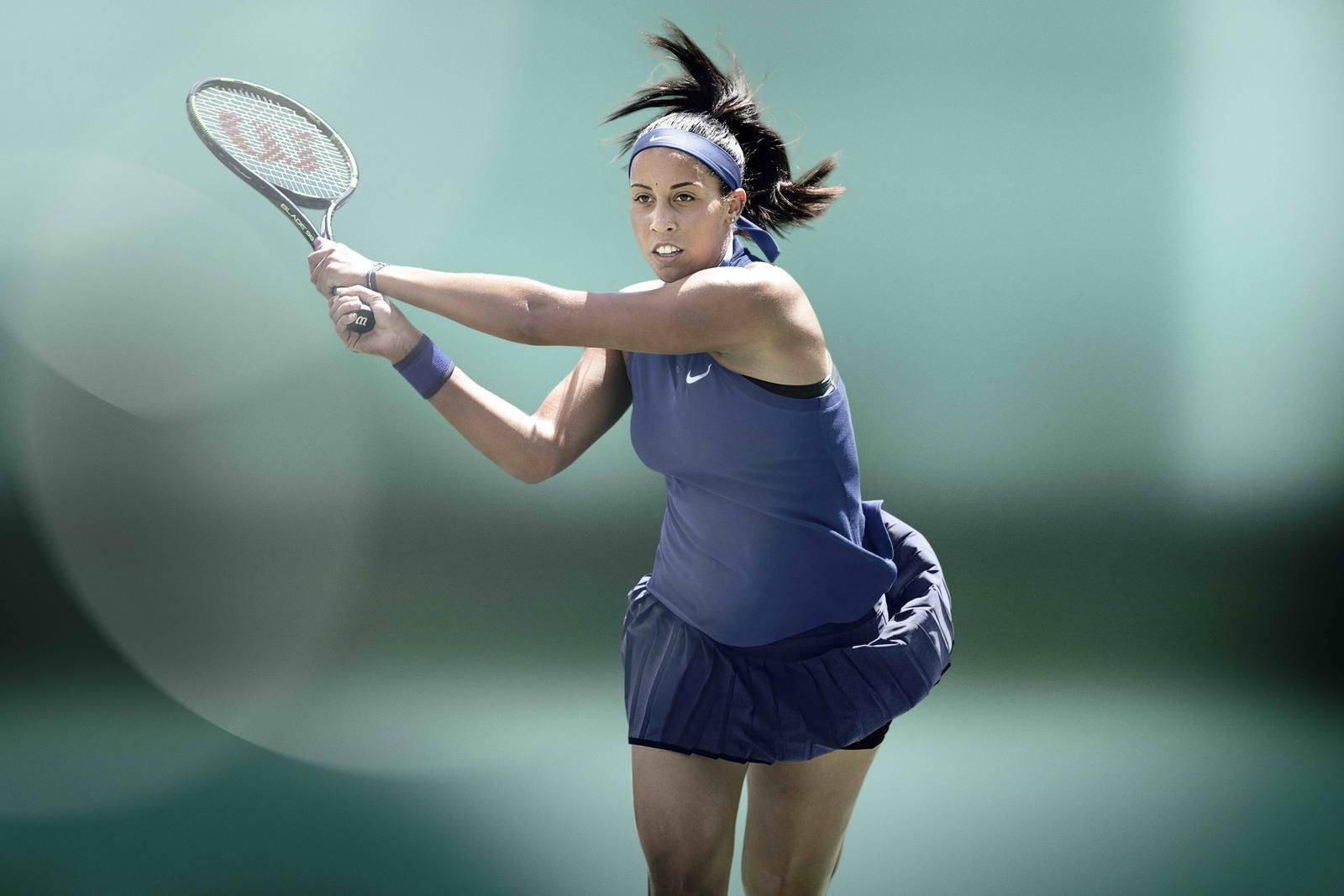 Madison Keys Swinging A Racket Background