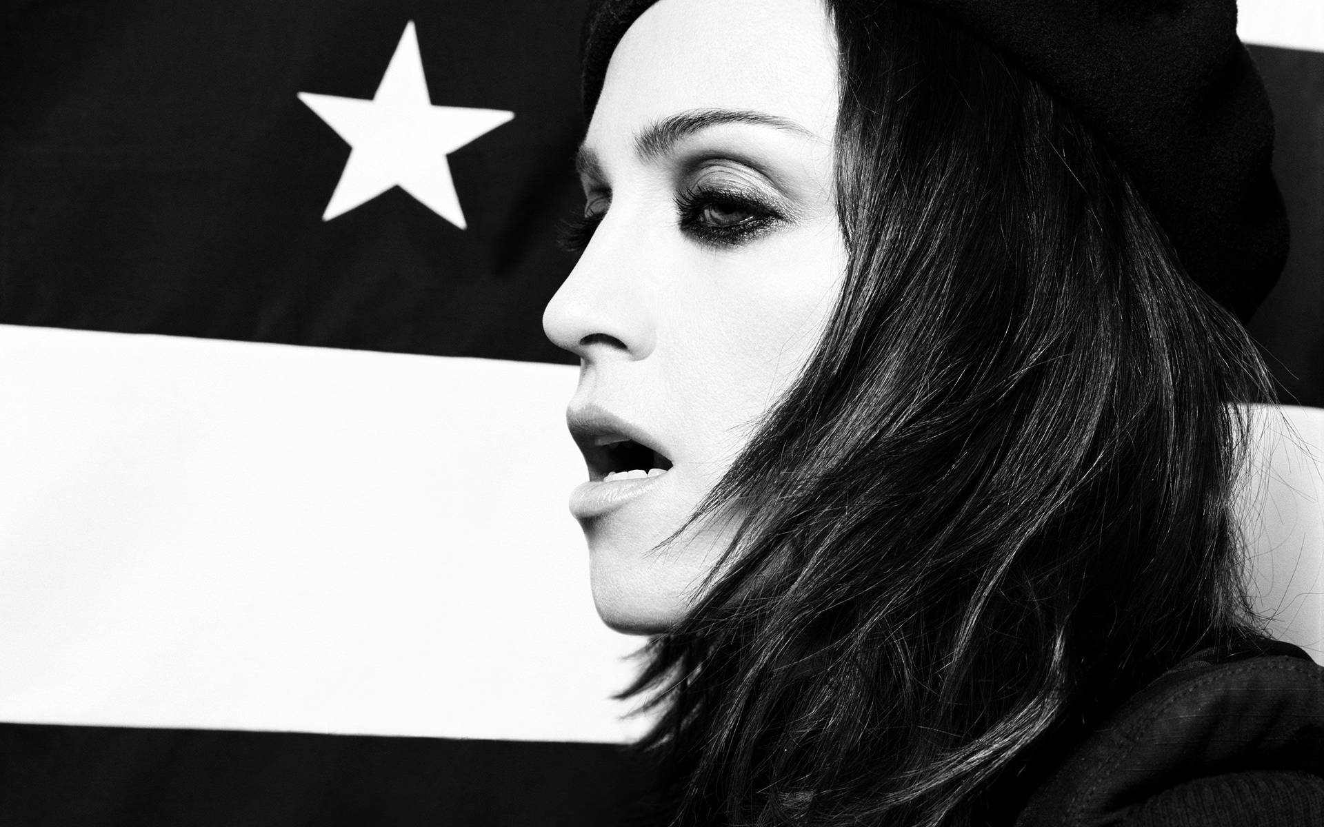 Madonna Elegantly Represents The Stars And Stripes Background