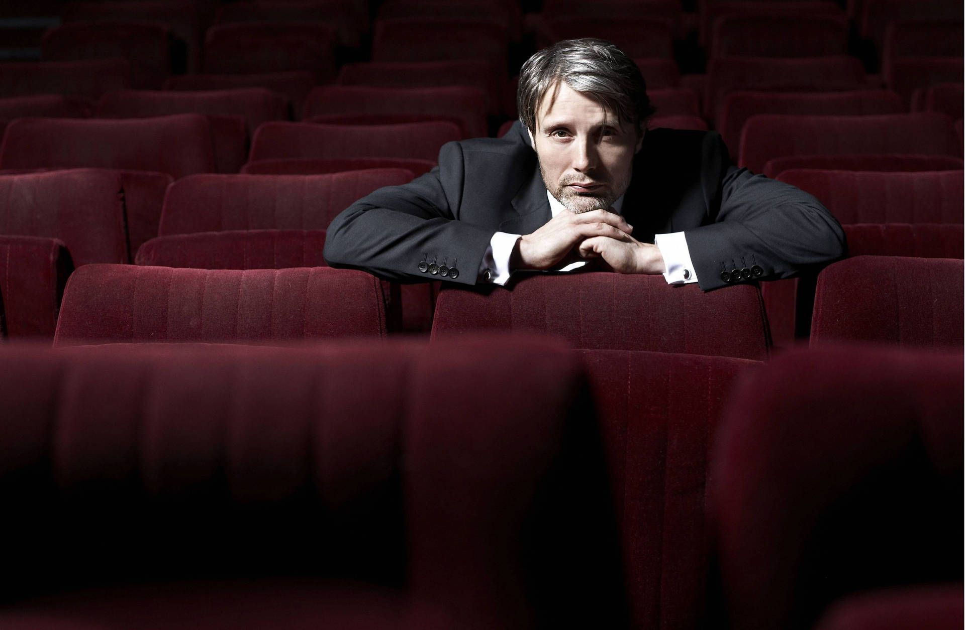 Mads Mikkelsen Photoshoot In Theater Background